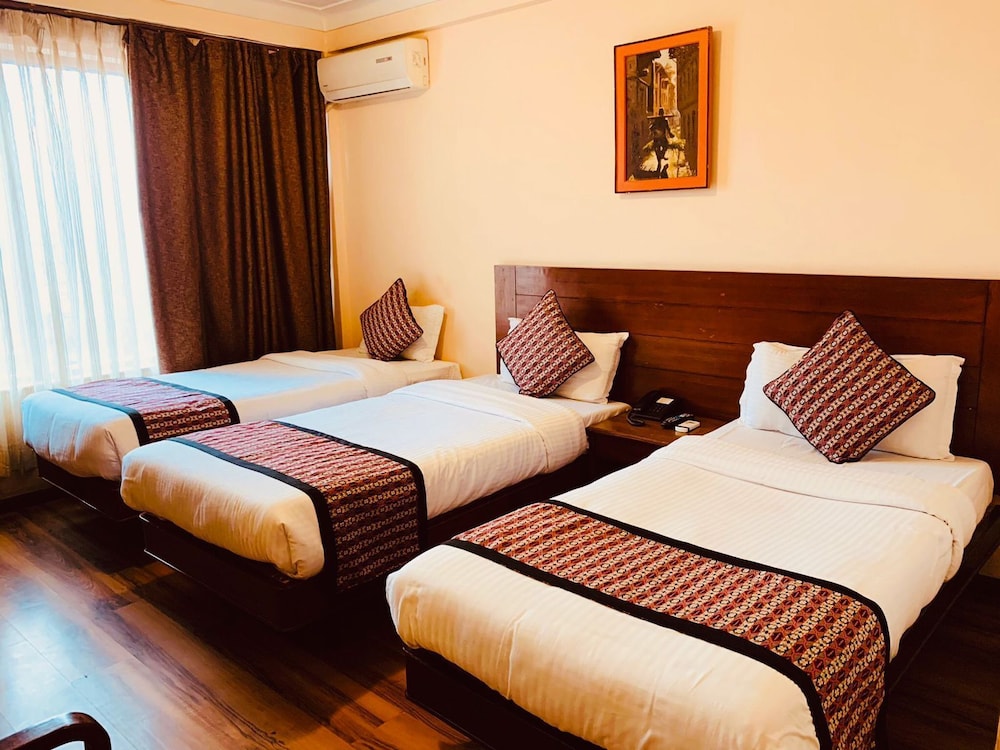 Deluxe Triple Room
