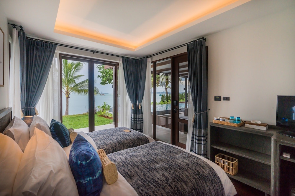 Two Bedroom Beachfront Grand Pool Villa - Photo 9
