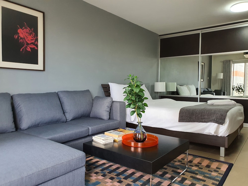 City Balcony Studio Apartment: Queen Bed + Sofa Bed + Working Desk photo 3