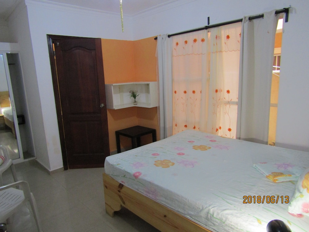 Double Room 1 Queen Bed with A/C - Ground floor and private Bathroom in a Shared Apartment