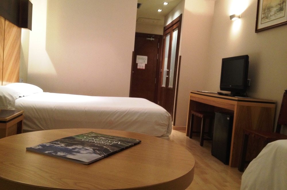 Triple Room - Photo 1