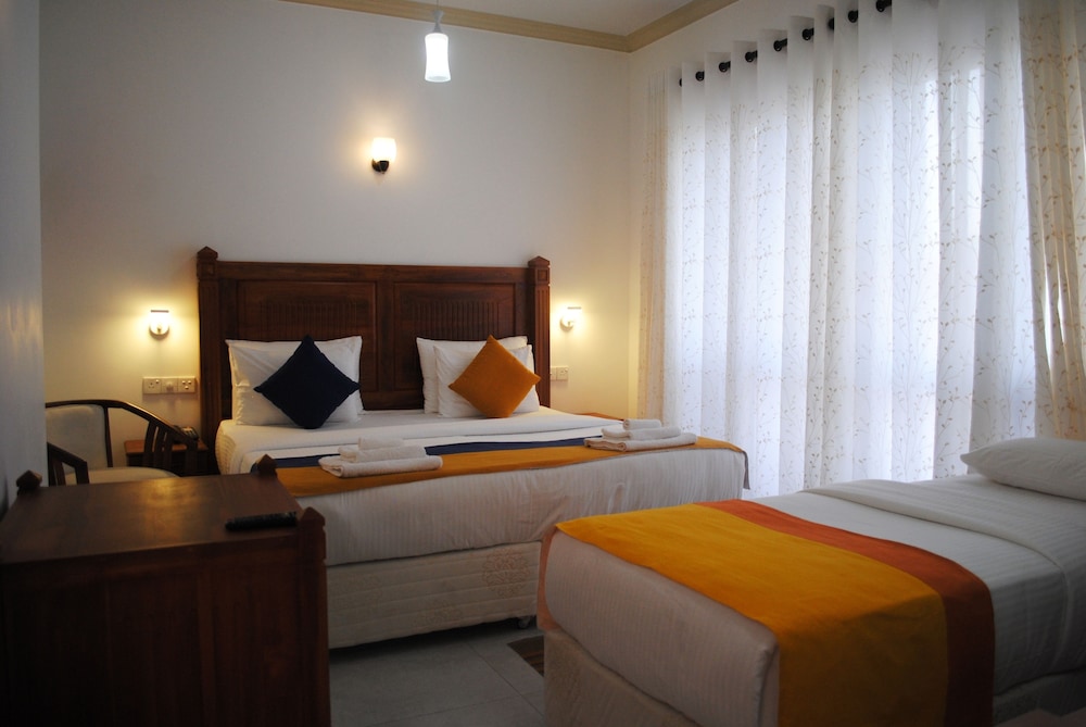 Deluxe Triple Room with Balcony photo 2