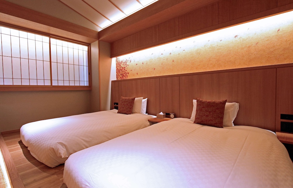 Deluxe Room, 2 Double Beds, Non Smoking, Bathtub,Ceiling height 3m(with Single Sofabed) - Photo 18