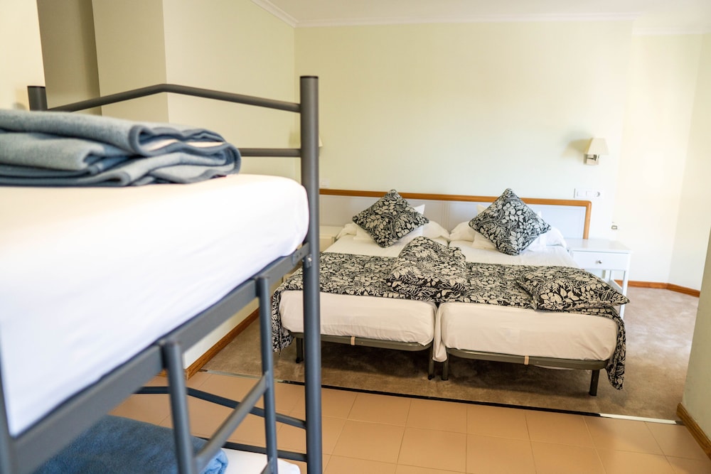Habitación Cuádruple, Baño Privado (Cama y Litera)