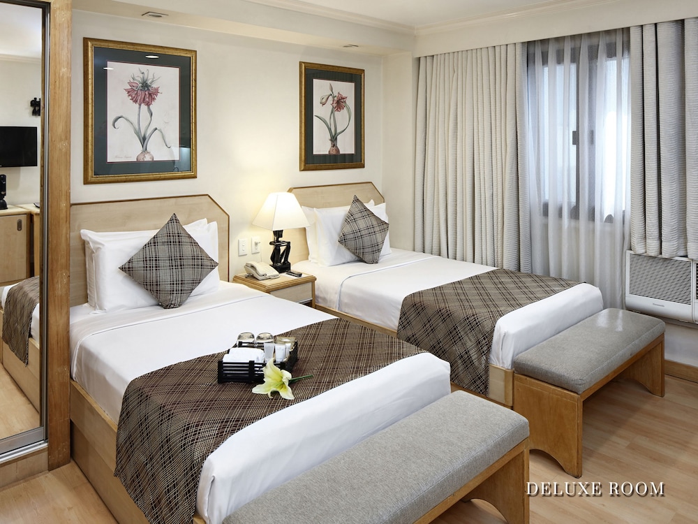 Deluxe Room - Photo 1