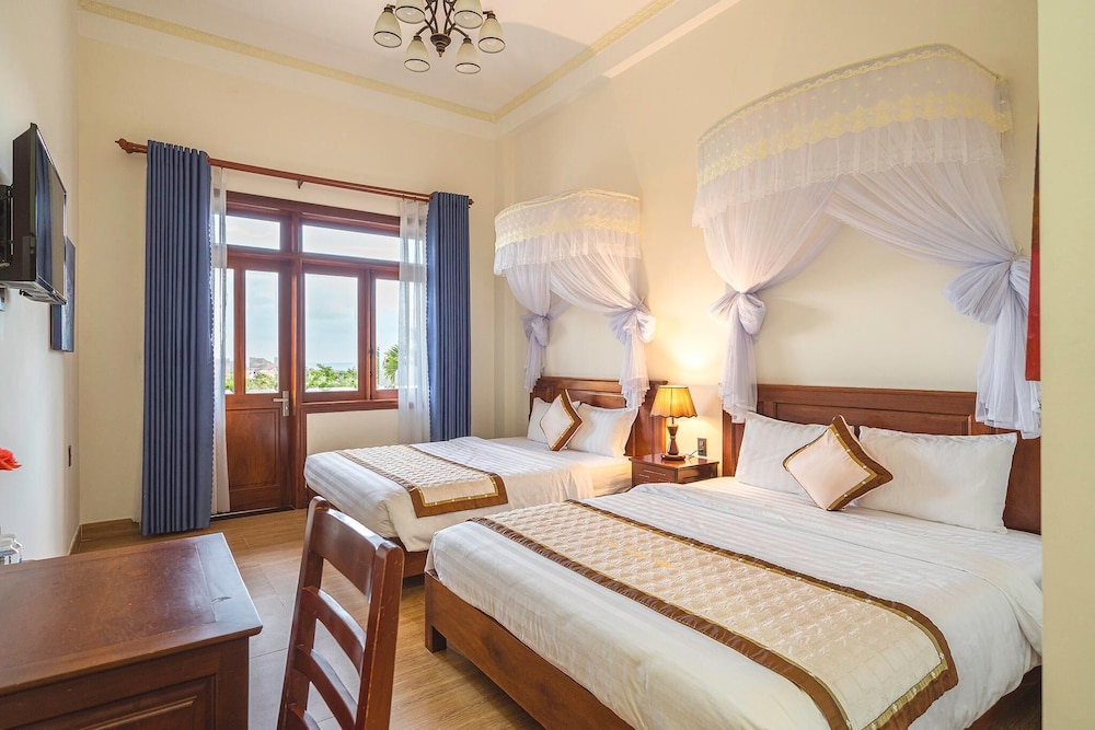 Standard Quadruple Room - Photo 2