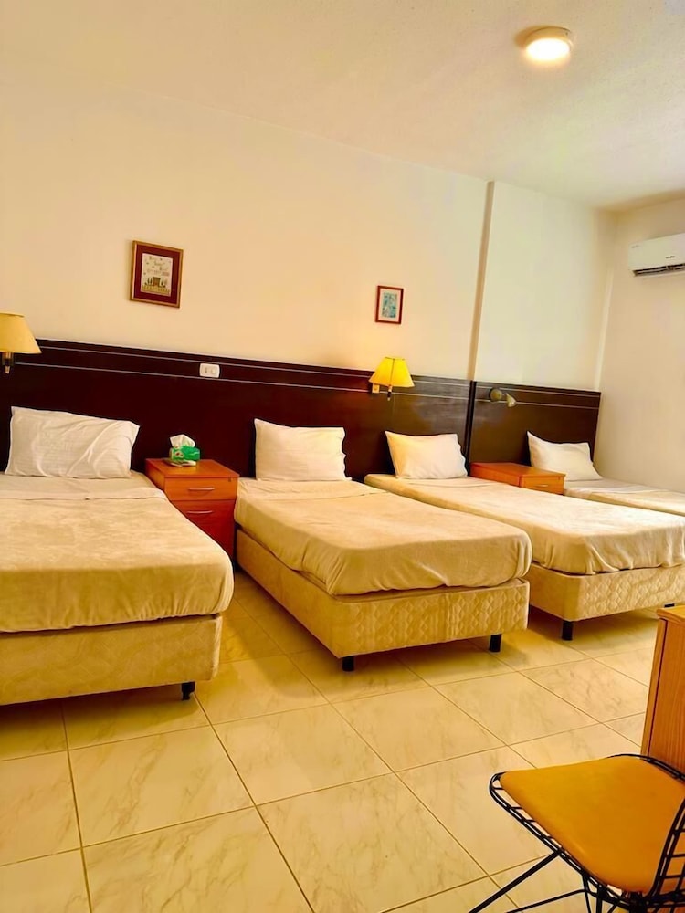 Deluxe Quadruple Room - Photo 1