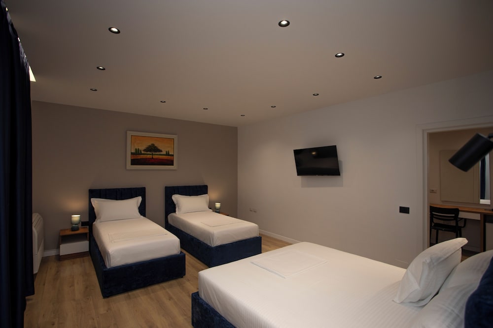 Family Quadruple Room, Patio, City View
