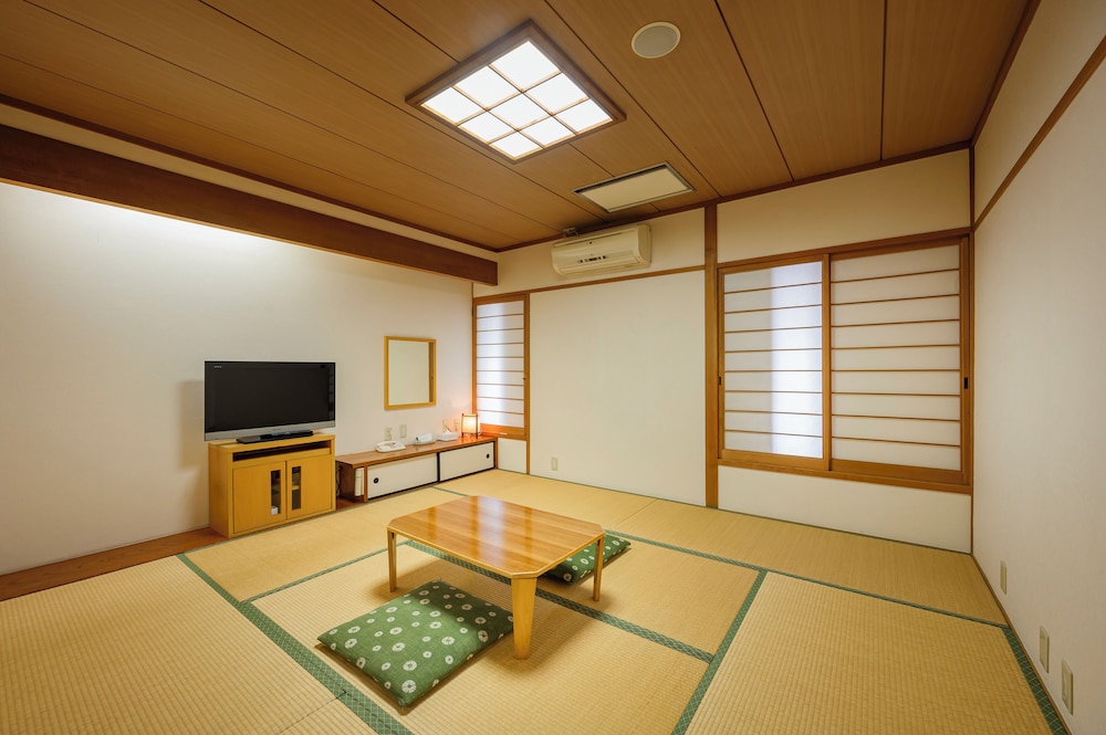 Classic Triple Room, City View