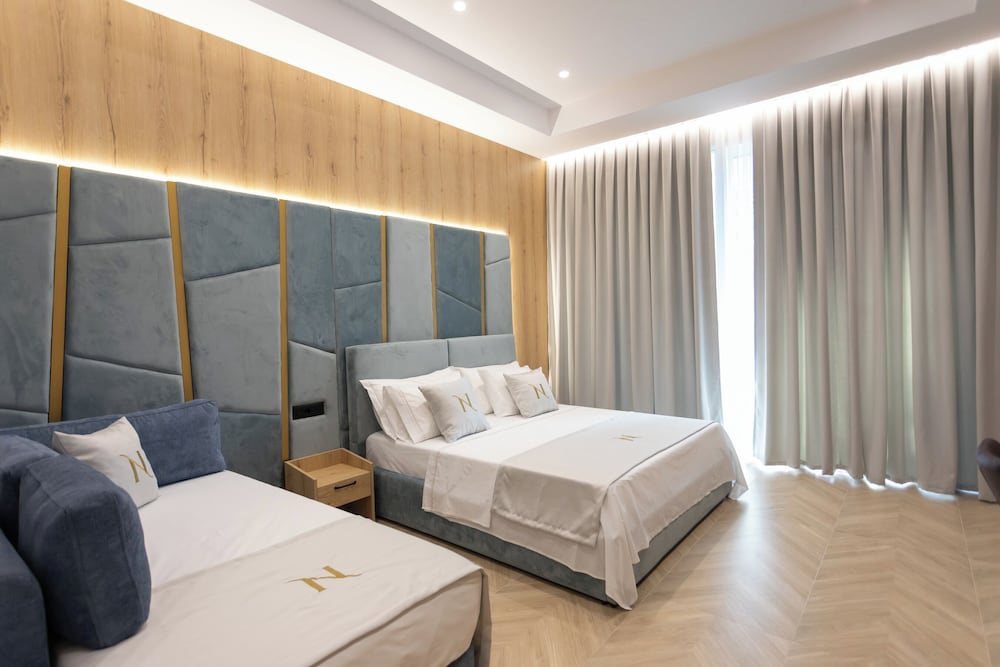 Deluxe Quadruple Room, Balcony, City View photo 1