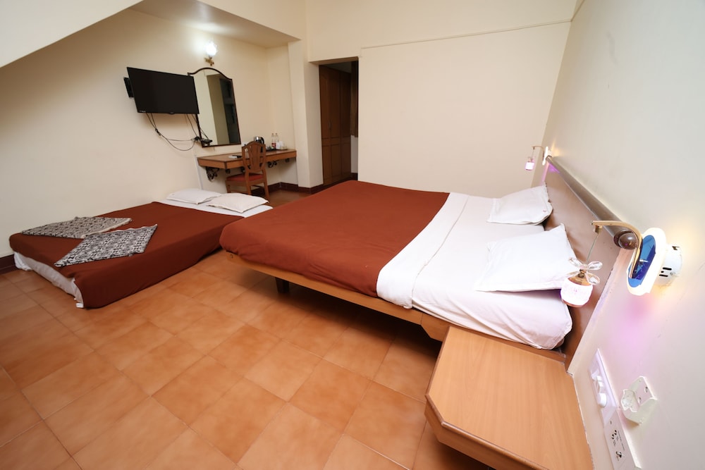 Deluxe Quadruple Room, 1 King Bed