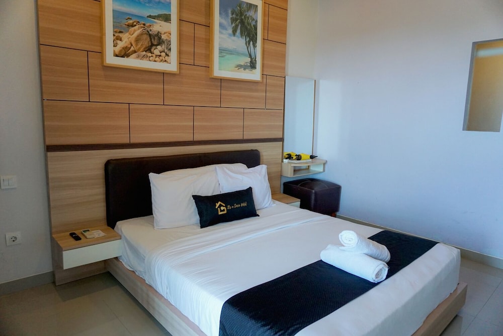 Deluxe Room - Photo 10