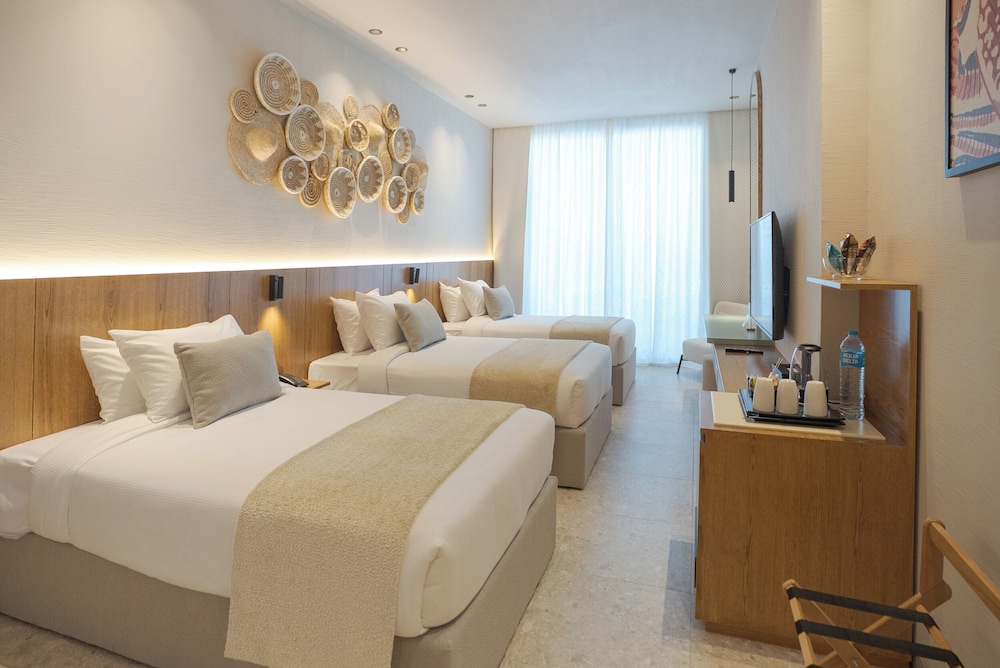 Deluxe Triple Room, Garden View - Photo 1