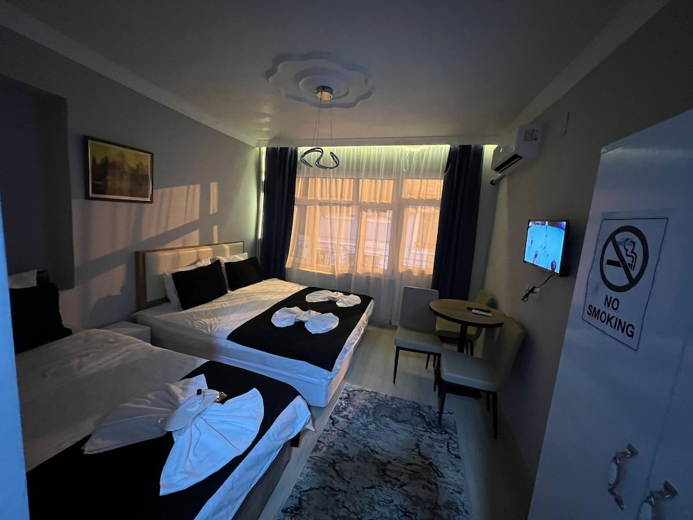 Deluxe Triple Room, Balcony photo 1