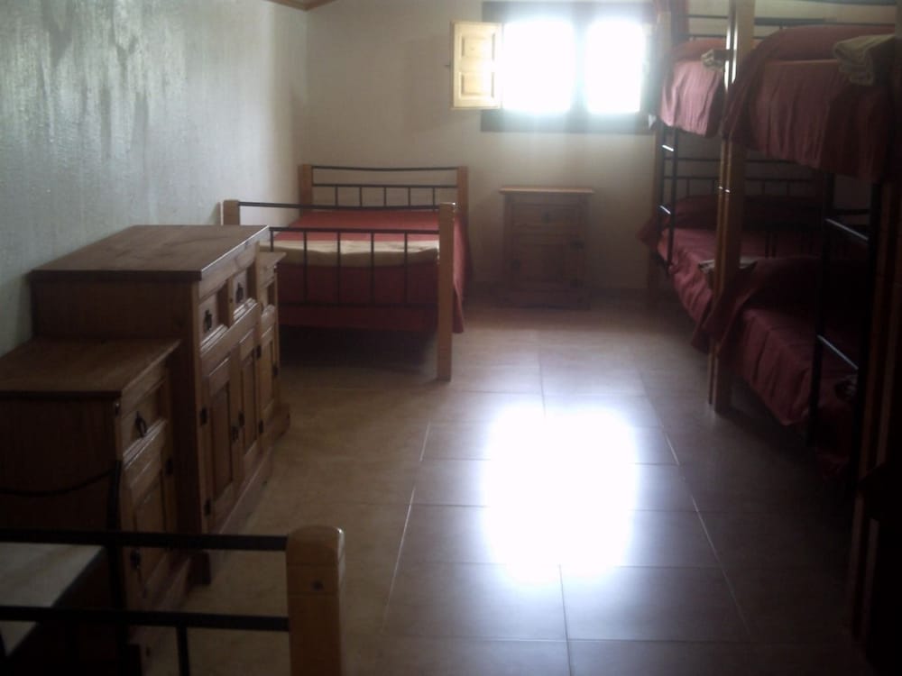 Cama en dormitorio compartido mixto para 8 personas