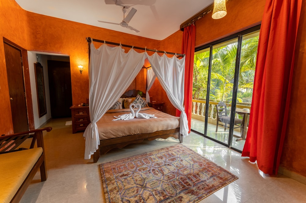 Deluxe Room with Private Balcony - Photo 1