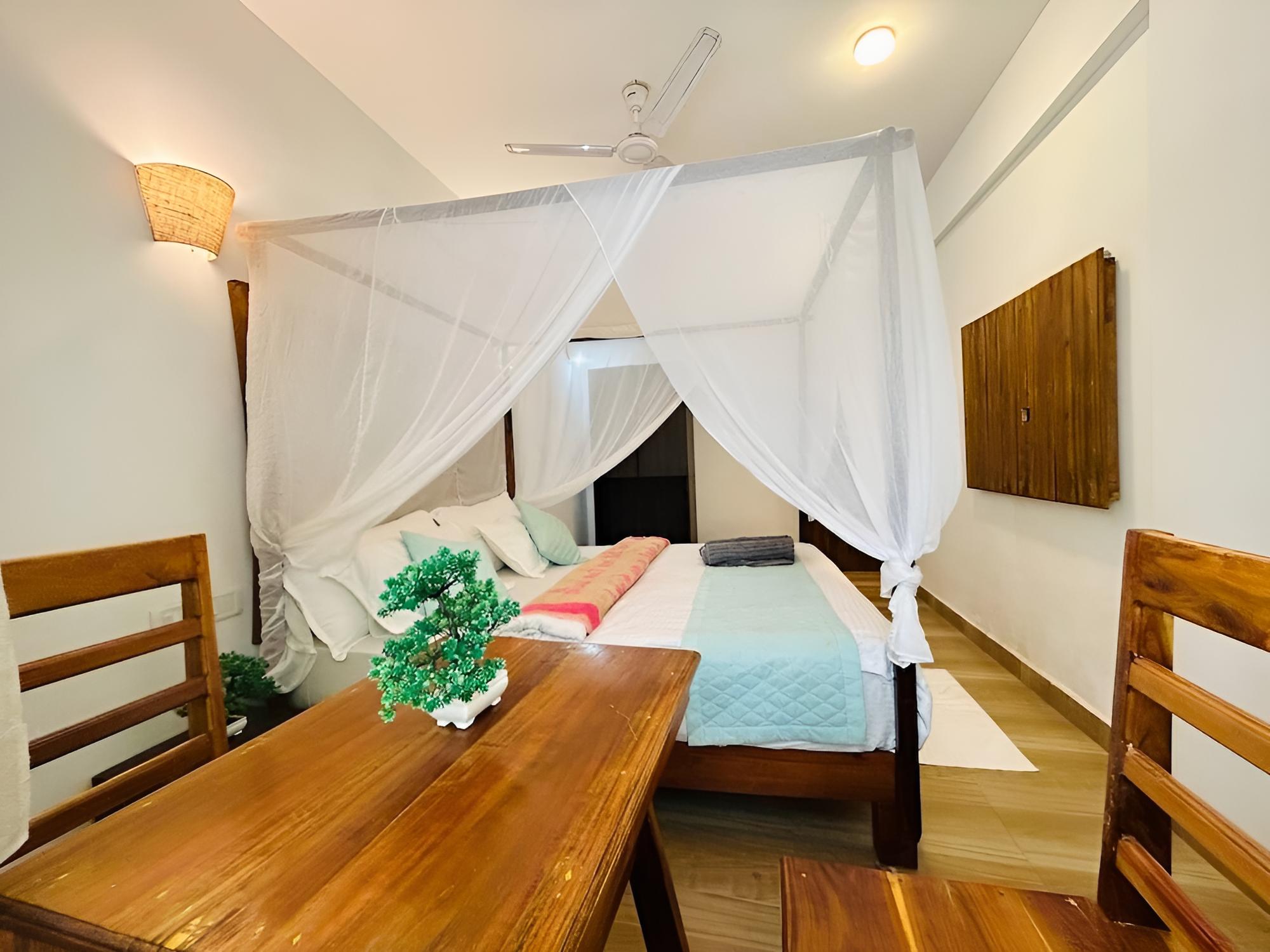 Deluxe Room - Photo 13
