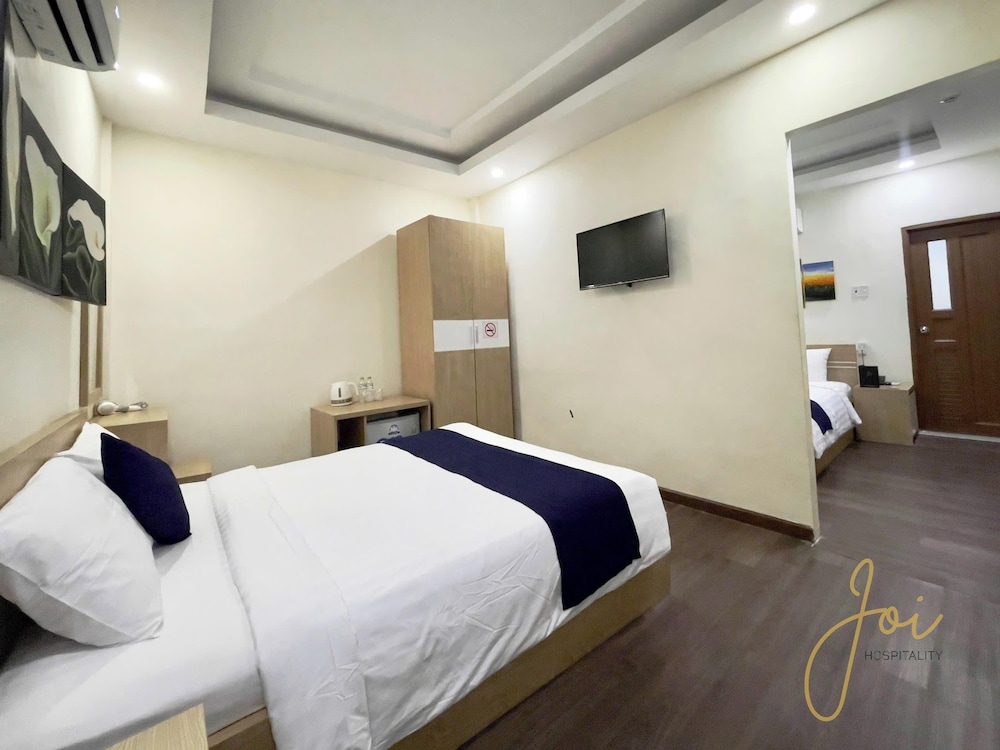 Signature Quadruple Room photo 3