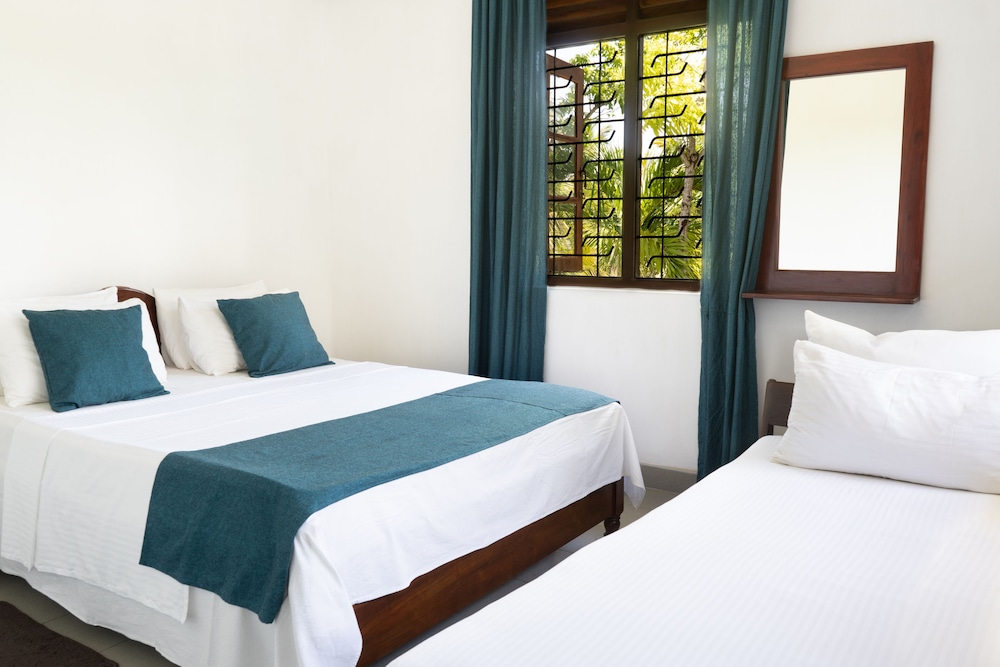 Standard Triple Room, 1 Bedroom, Non Smoking, Garden View photo 1