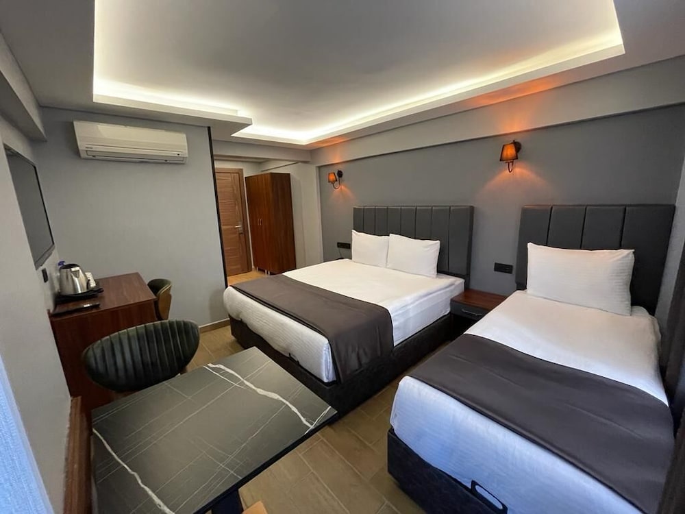Economy Triple Room, Balcony photo 1