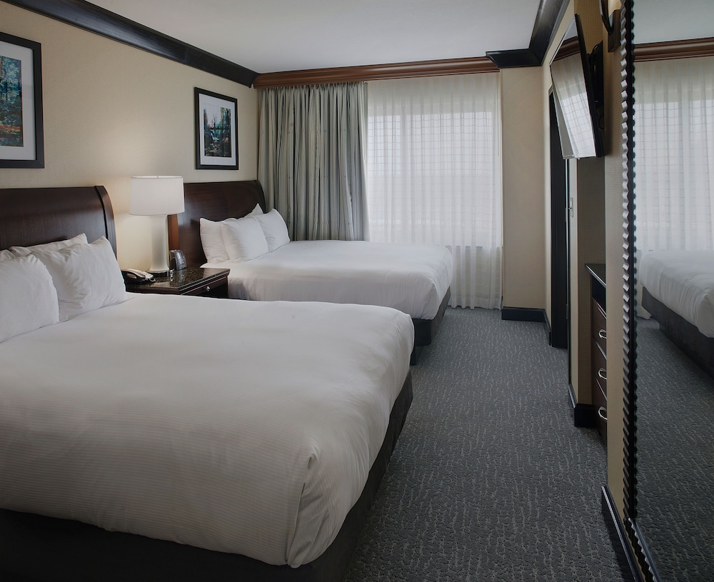 Deluxe Suite, Two Queen and One Sofa Bed - Photo 1