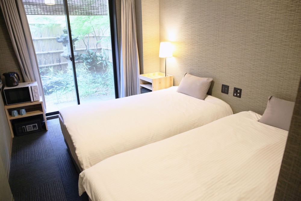 Standard Twin Room - Photo 1