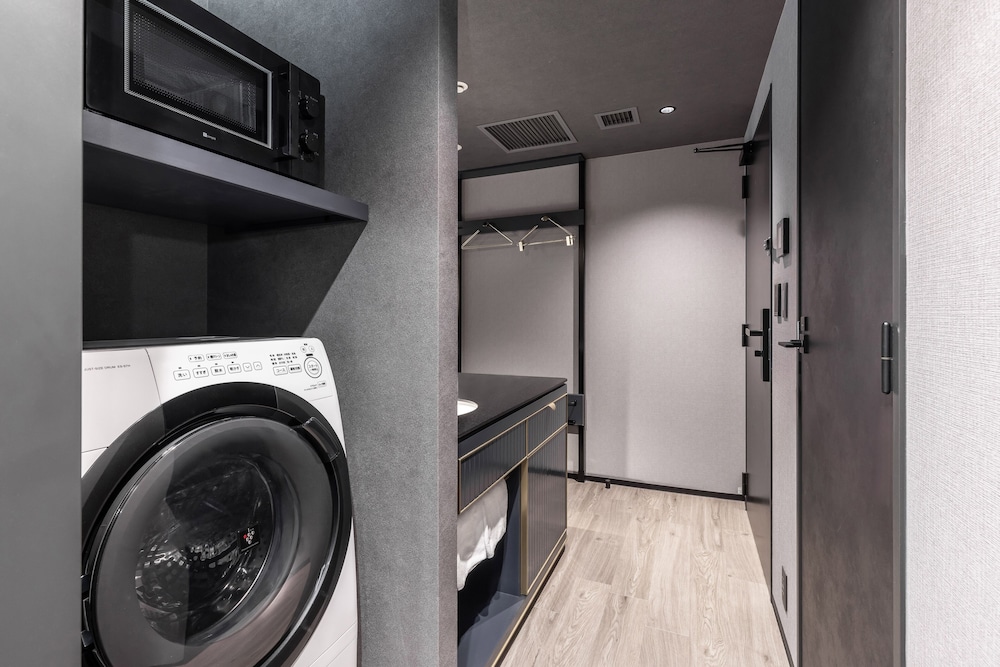 Deluxe Twin Room (with Washing Machine) - Photo 4