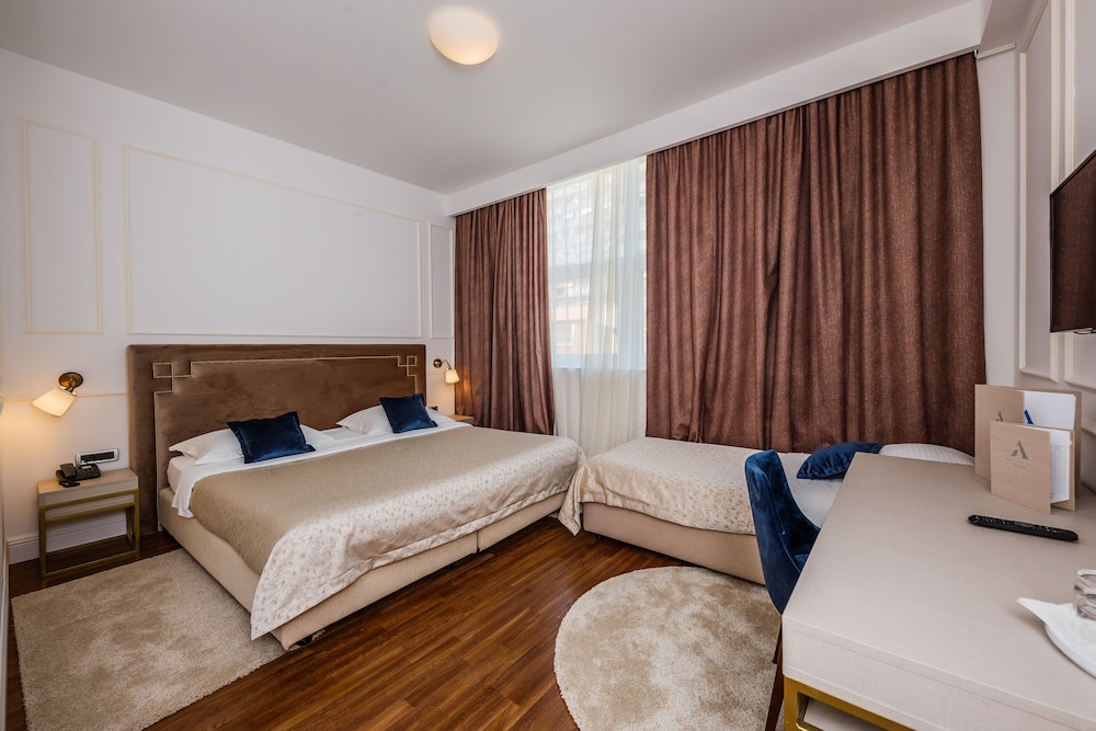 Standard Triple Room - Photo 1