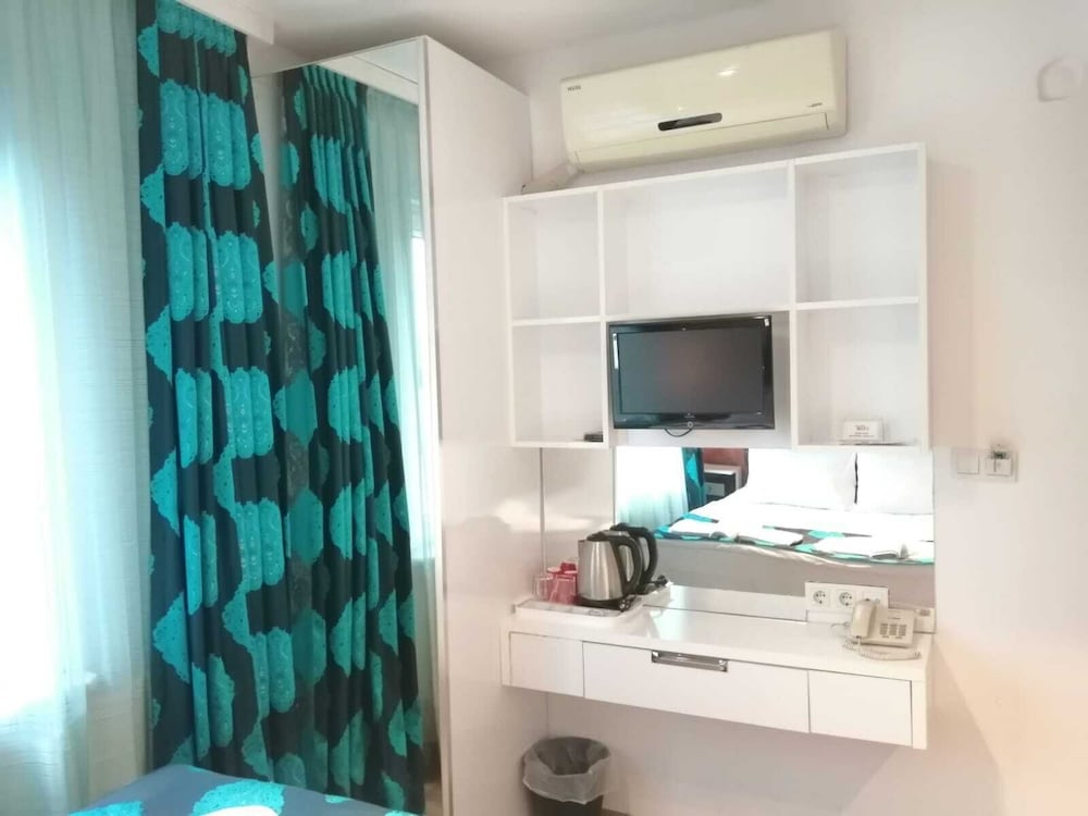 Family Triple Room, Garden View photo 3