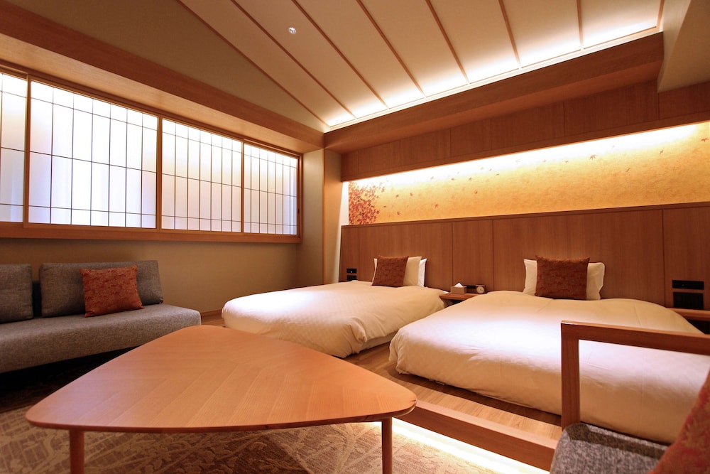 Deluxe Room, 2 Double Beds, Non Smoking, Bathtub,Ceiling height 3m(with Single Sofabed) - Photo 1
