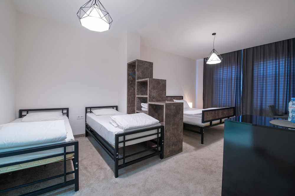 Family Quadruple Room, Multiple Beds, Private Bathroom photo 2