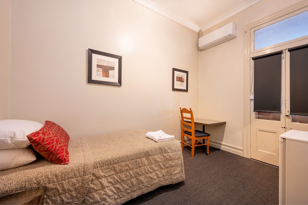 Classic Single Room with Balcony and Shared Bathroom