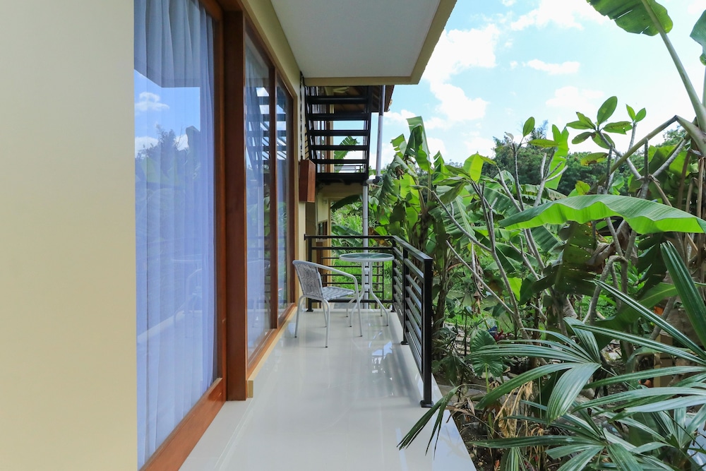 Superior Tropical Room - Photo 8