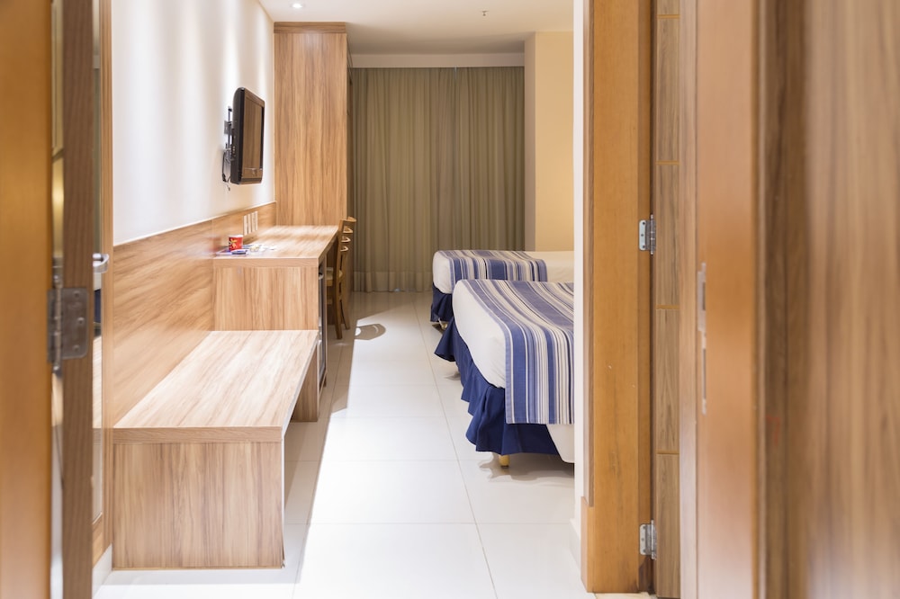 Deluxe Triple Room - Photo 13