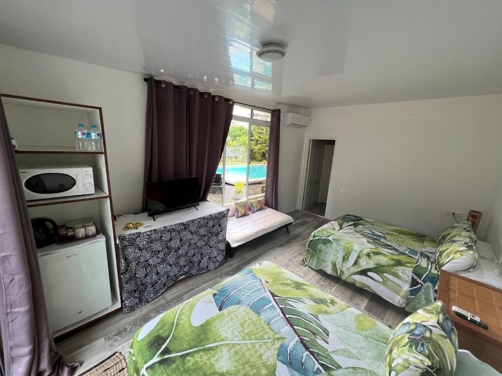 Classic Quadruple Room, Pool View, Garden Area photo 1