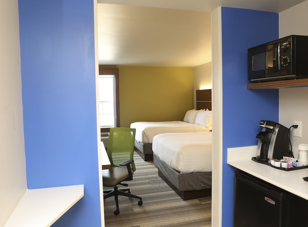 hotel room with two queen beds and a kitchenette