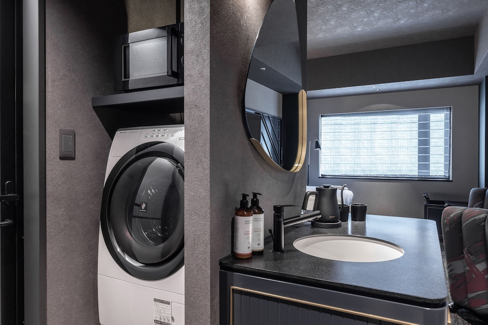 Deluxe Twin Room (with Washing Machine) - Photo 5