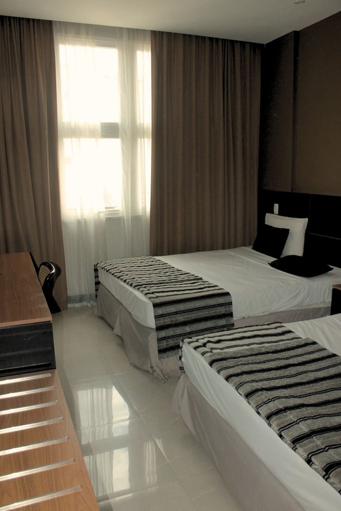Deluxe Quadruple Room