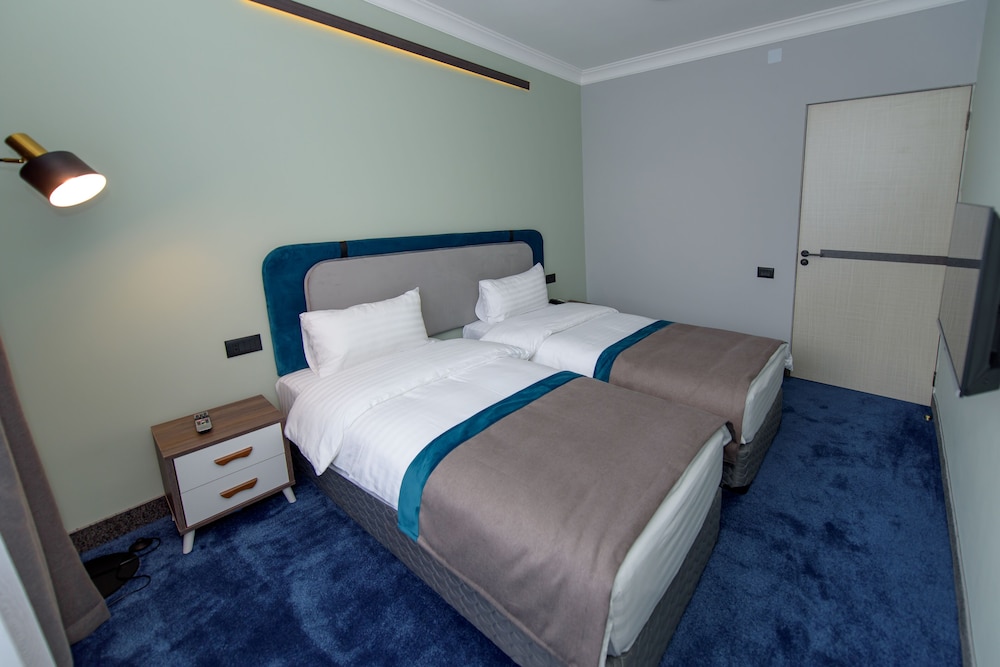 Executive Quadruple Room photo 2
