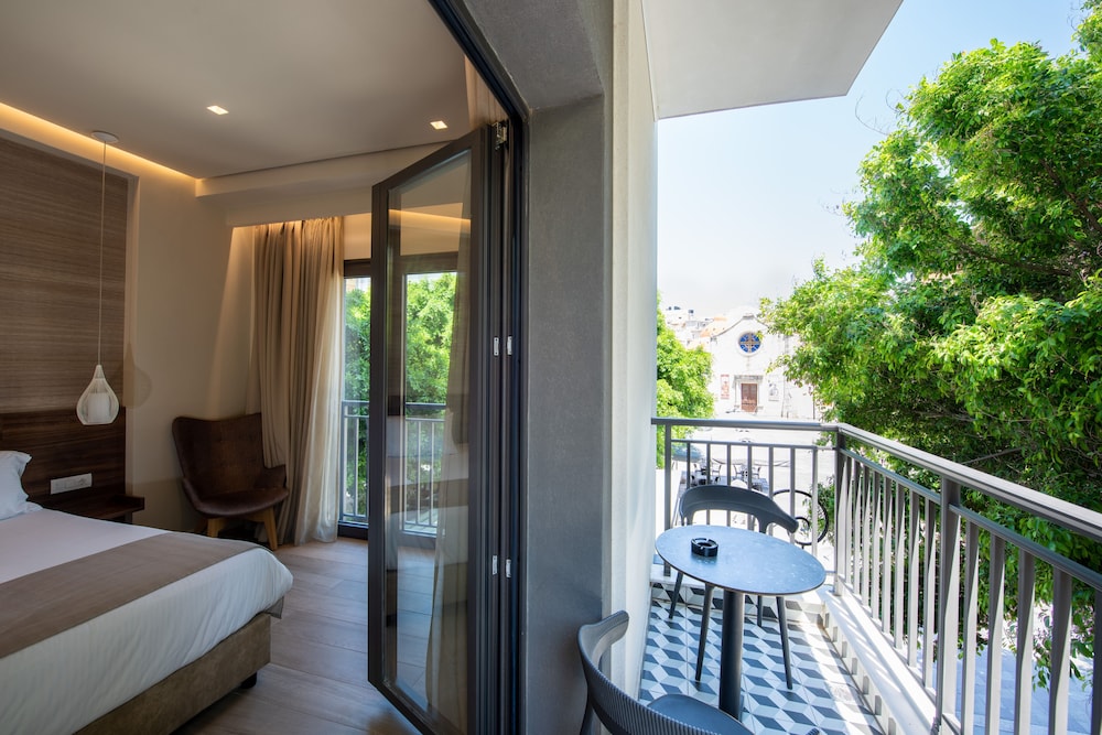 Deluxe Room with Balcony and City View
