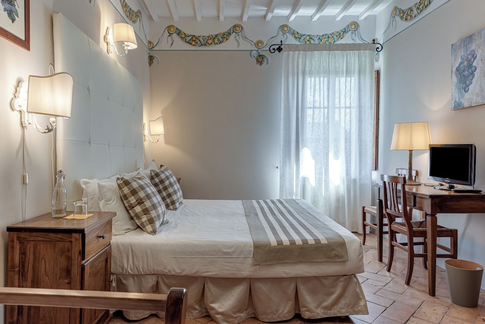 Camera Small con letto francese (12 mq - Giardino Segreto)
