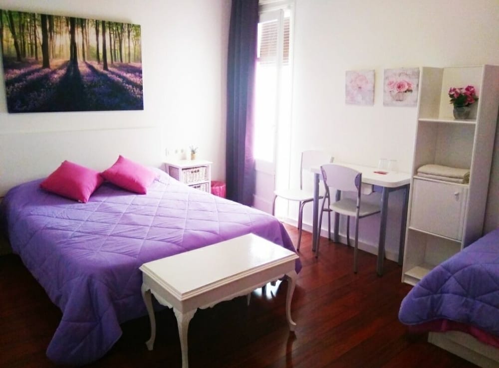 Habitación Triple Clásica, Múltiples Camas, Vista al Patio