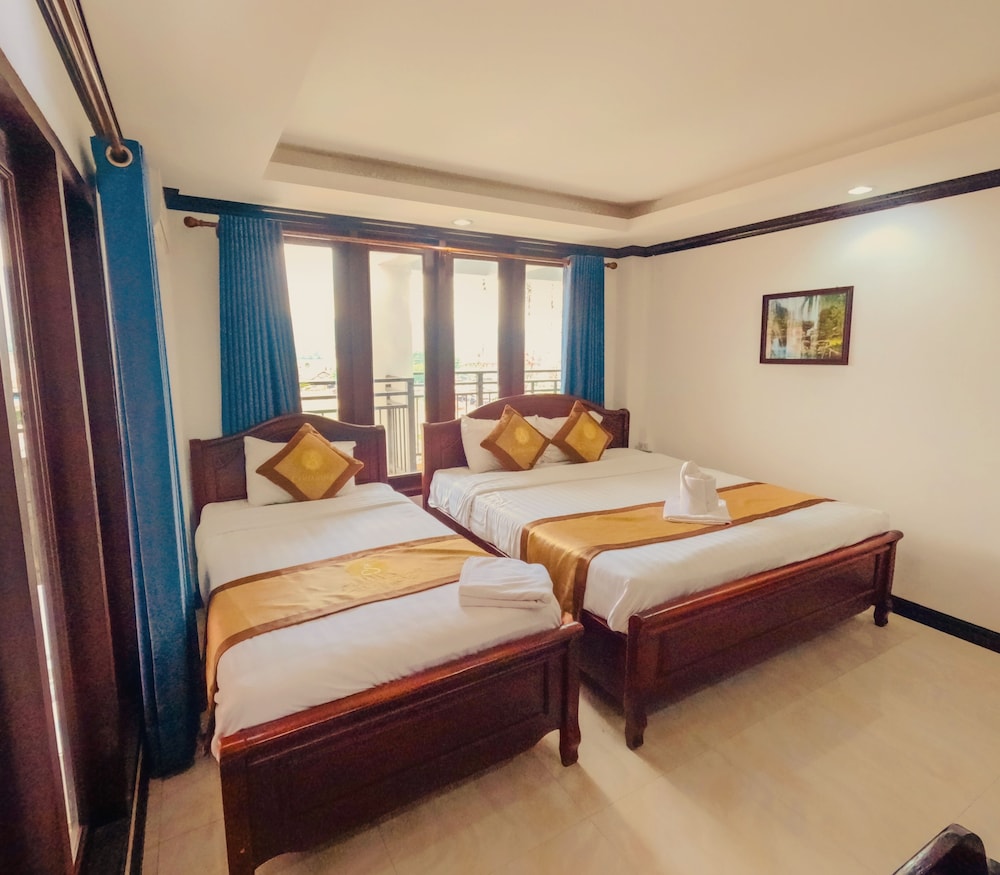 Deluxe Triple Room With Balcony - Photo 11