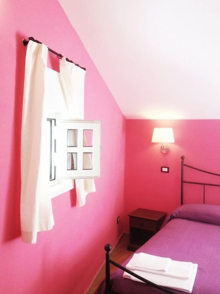 Quarto Triplo (Suíte Real Rosa)
