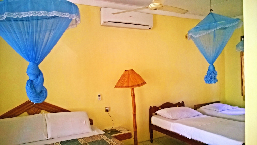 Standard Quadruple Room, 1 Bedroom, Non Smoking, Garden View photo 3