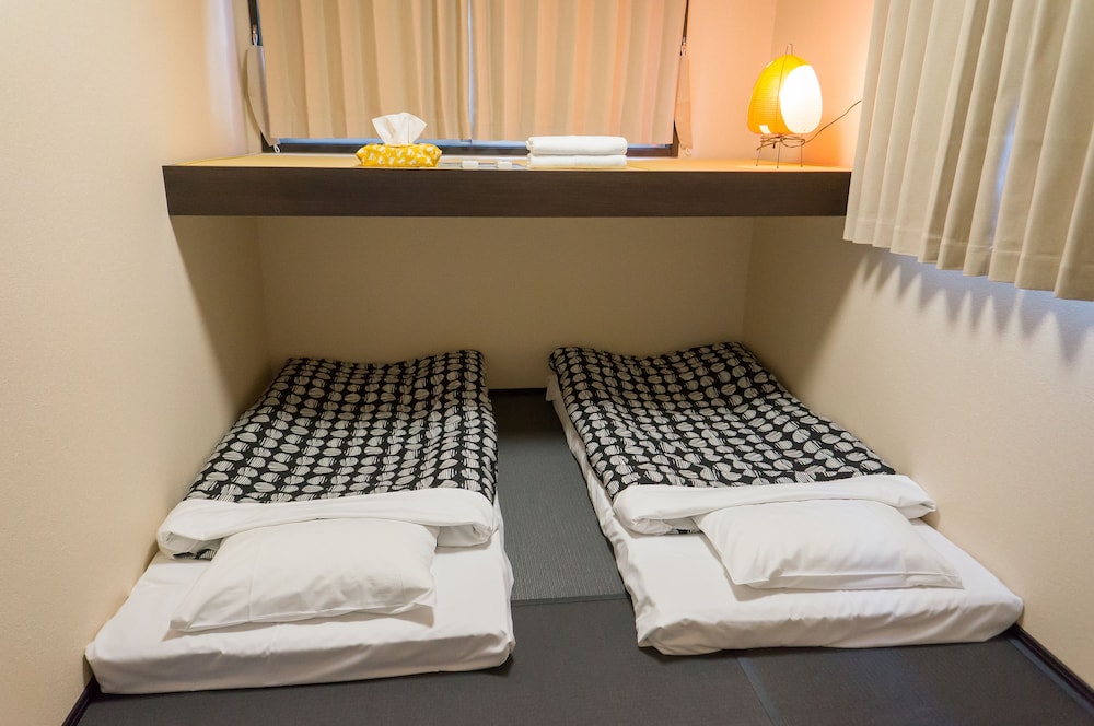 Private twin room with 1 Lofted bed, Shared Toilet and Shower photo 2