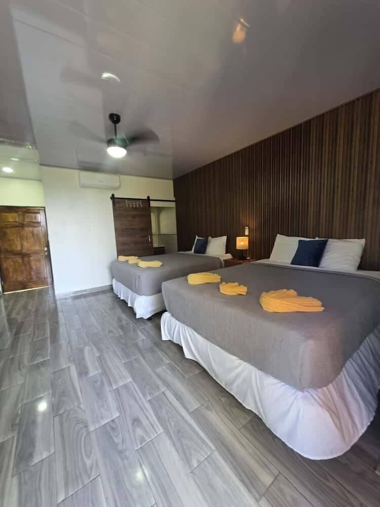Exclusive Room, 2 Queen Beds, Balcony, Partial Ocean View photo 2