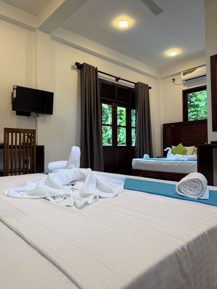 Deluxe Quadruple Room with AC