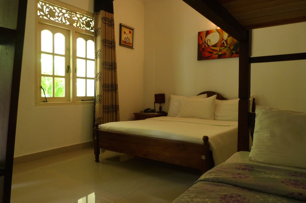 Standard Quadruple Room, 1 Bedroom, Garden View photo 3