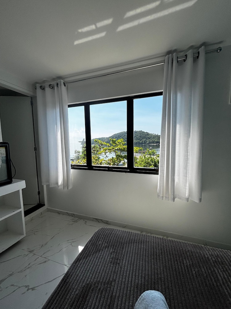 Deluxe Studio Suite, 1 Bedroom, Air conditioning, Beach View photo 3